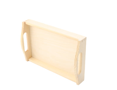 A rectangular wooden tray with cut out handles on a white background